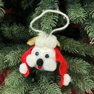 Festive Dog Ornament with Red and White Accents